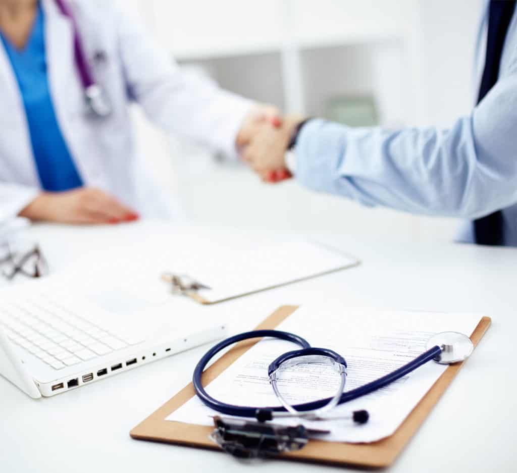 Two people shaking hands